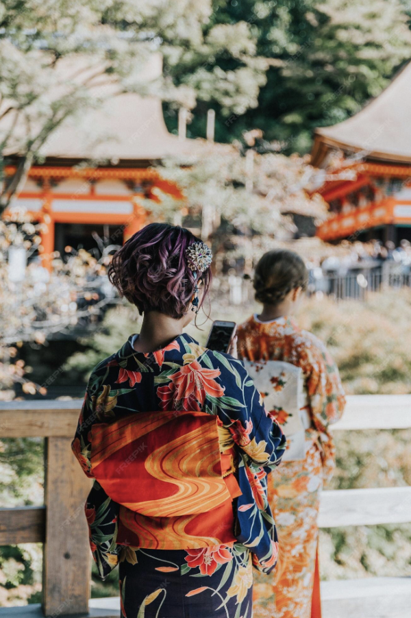 Two female wear Traditional Japanese clothes KIMONO